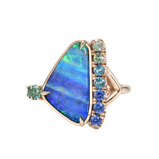 An Australian Opal Ring by NIXIN Jewelry with a Boulder Opal and sapphires set in rose gold.