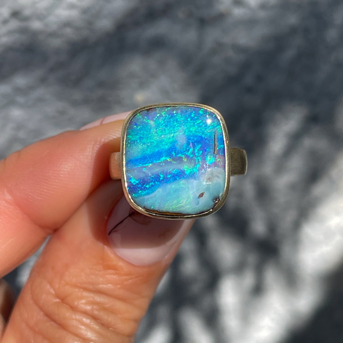 An Australian Opal Ring by NIXIN Jewelry. A Boulder Opal ring made in 14k gold.