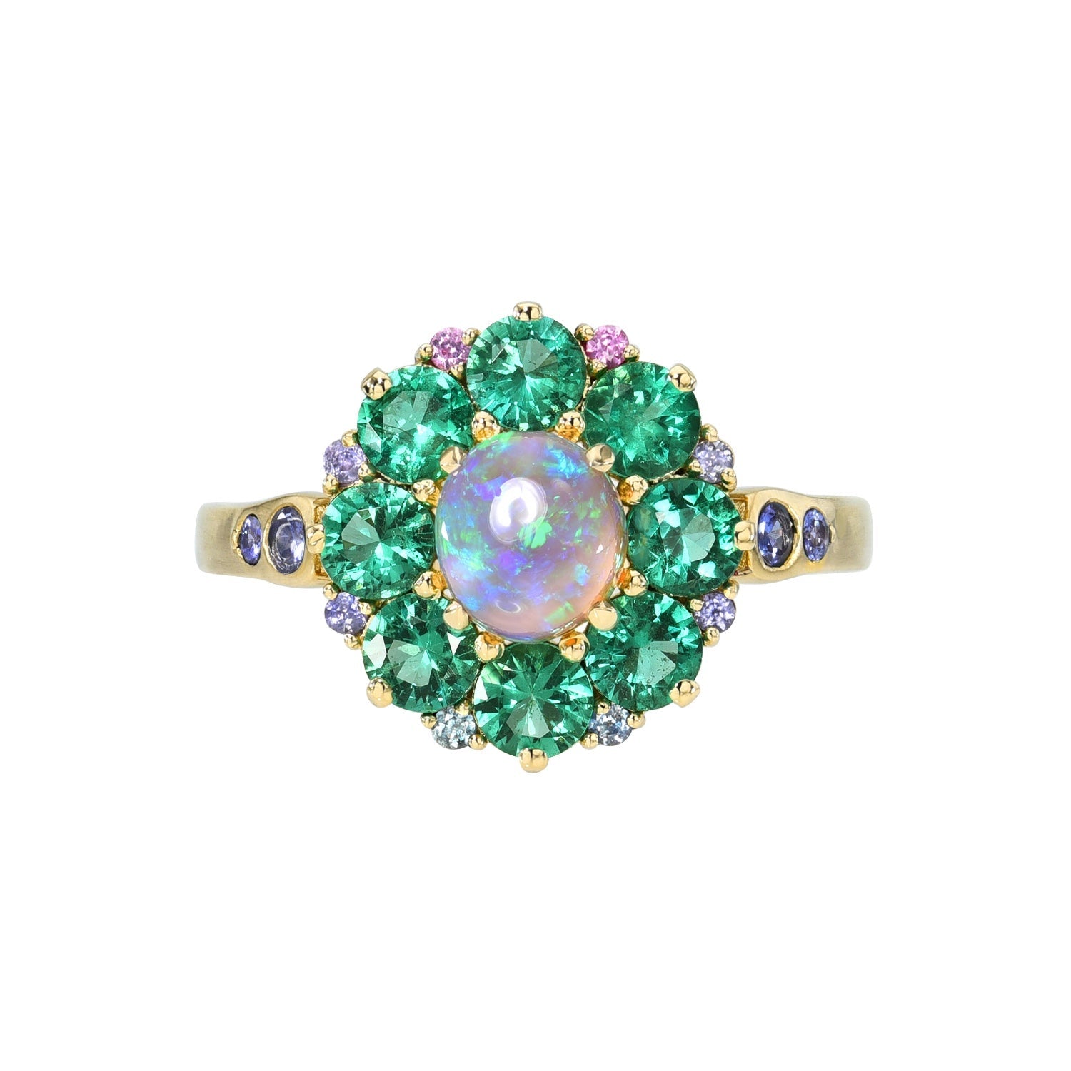 An Australian Opal Ring by NIXIN Jewelry. An emerald and opal ring made in 14k gold.