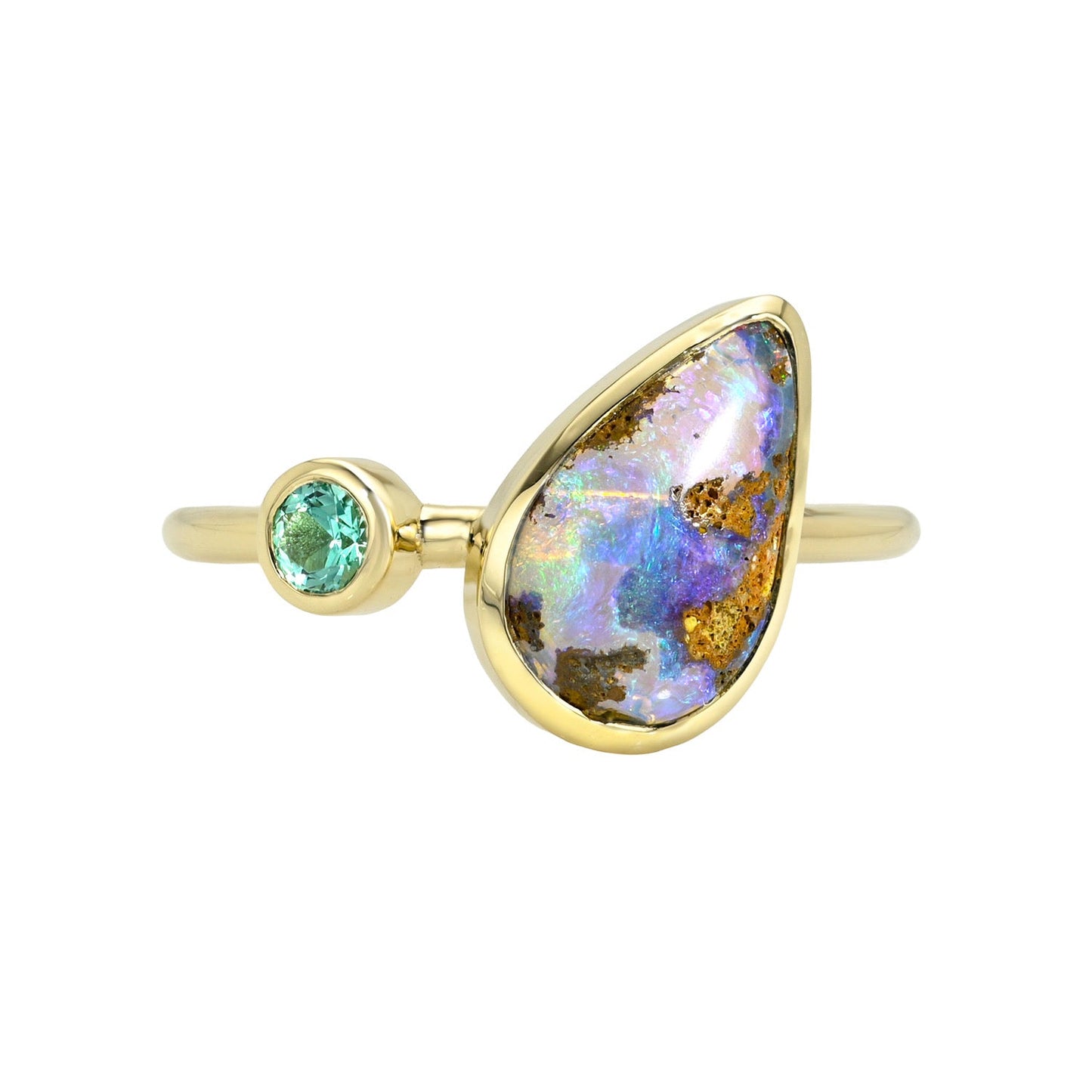 This clean studio shot features an Australian Opal Ring by NIXIN Jewelry, showcasing a two-stone design on a neutral white background. The luxury ring combines a vibrant, pear-shaped pipe opal with a round brilliant emerald, both secured in polished yellow gold bezel settings. This view highlights the precise craftsmanship of this piece of unique fine jewelry.