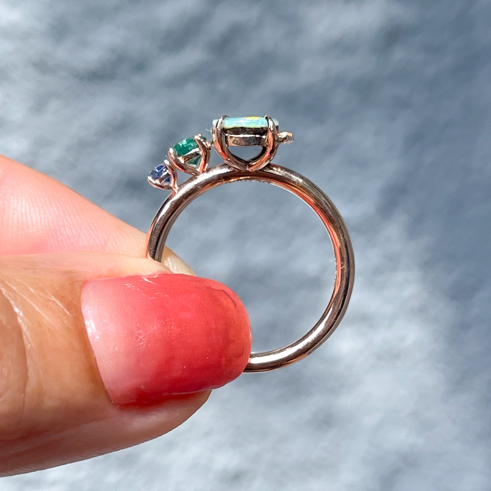 Side view of an Australian Opal Ring by NIXIN Jewelry, showing its profile.