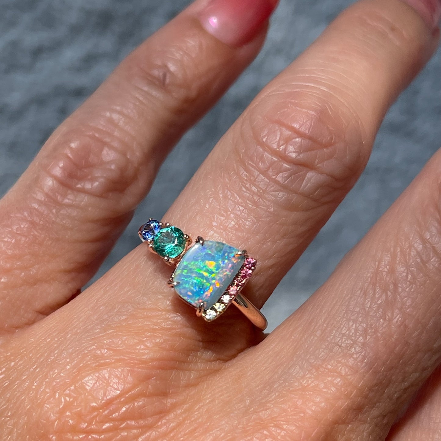 An Australian Opal Ring by NIXIN Jewelry made with a Boulder Opal. The blue opal ring is a rare piece of opal jewelry.