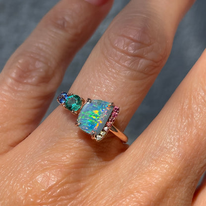 An Australian Opal Ring by NIXIN Jewelry with prong setting. A Boulder opal ring made in 14k rose gold.