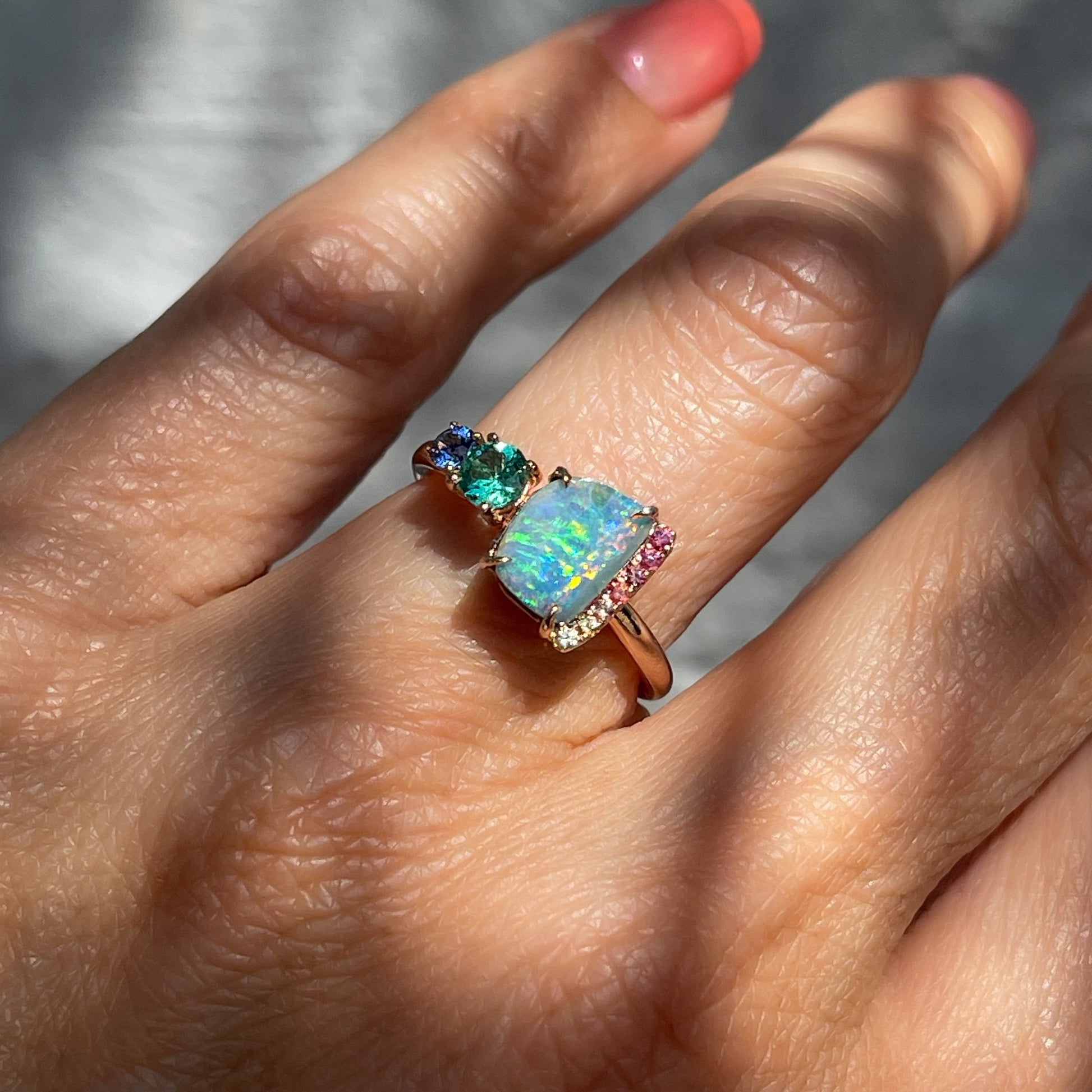 An Australian Opal Ring by NIXIN Jewelry. A rose gold opal ring elevated as jewelry art.