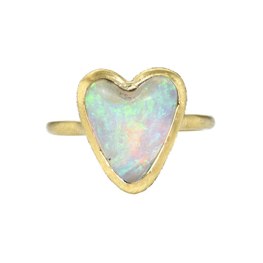 An Australian Opal Ring by NIXIN Jewelry with a Crystal Opal and pave diamonds set in gold.