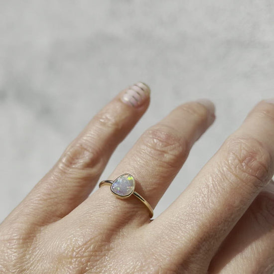 Video of rainbow opal ring by NIXIN Jewelry worn on hand