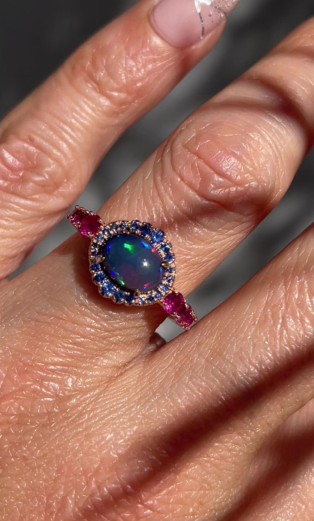 Video of Sapphire and Opal Ring by NIXIN Jewelry on hand. Natural Australian opal ring.