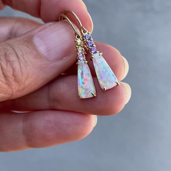 Video of gold opal earrings by NIXIN Jewelry in shade and sunlight
