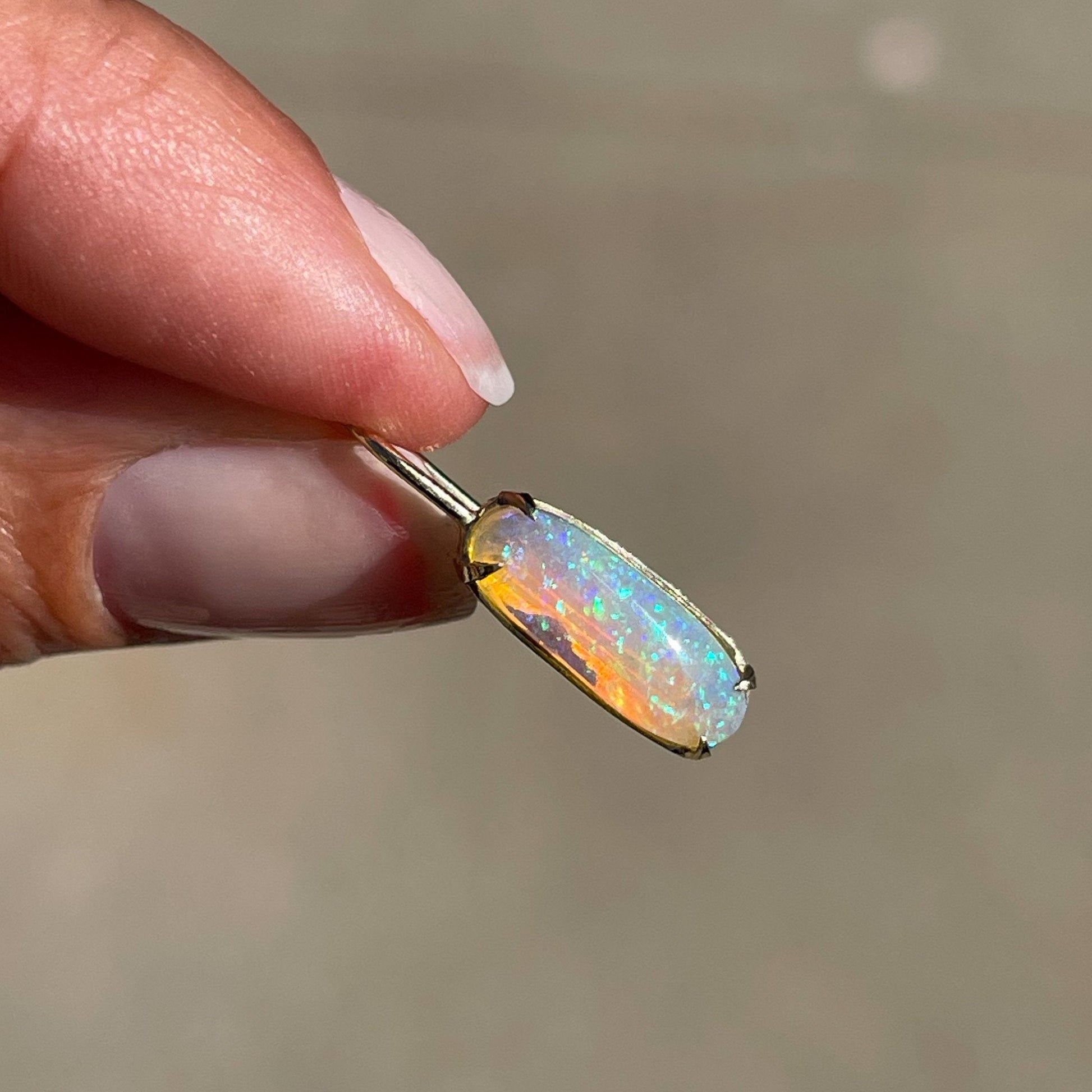 Australian opal earrings in 14k gold by NIXIN Jewelry