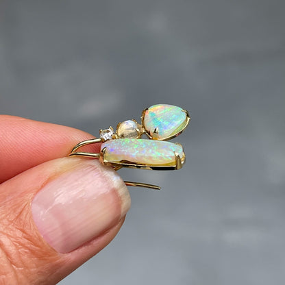 Side view of opal drop earrings by NIXIN Jewelry