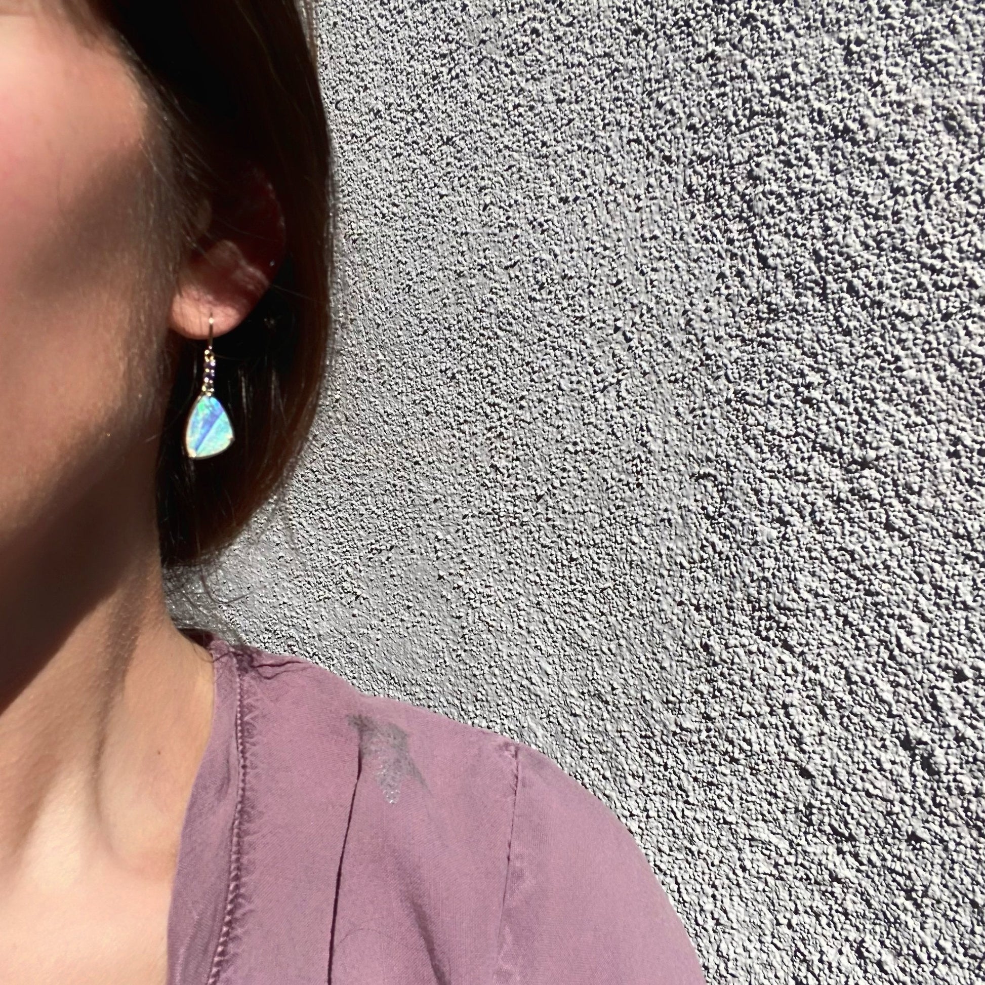 Gold Crystal Opal Earrings by NIXIN Jewelry on model