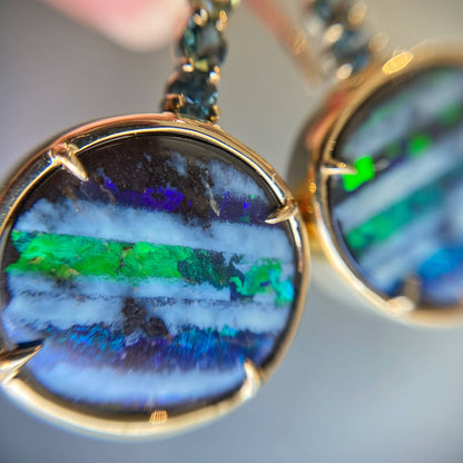 Close up of green opal earrings by NIXIN Jewelry