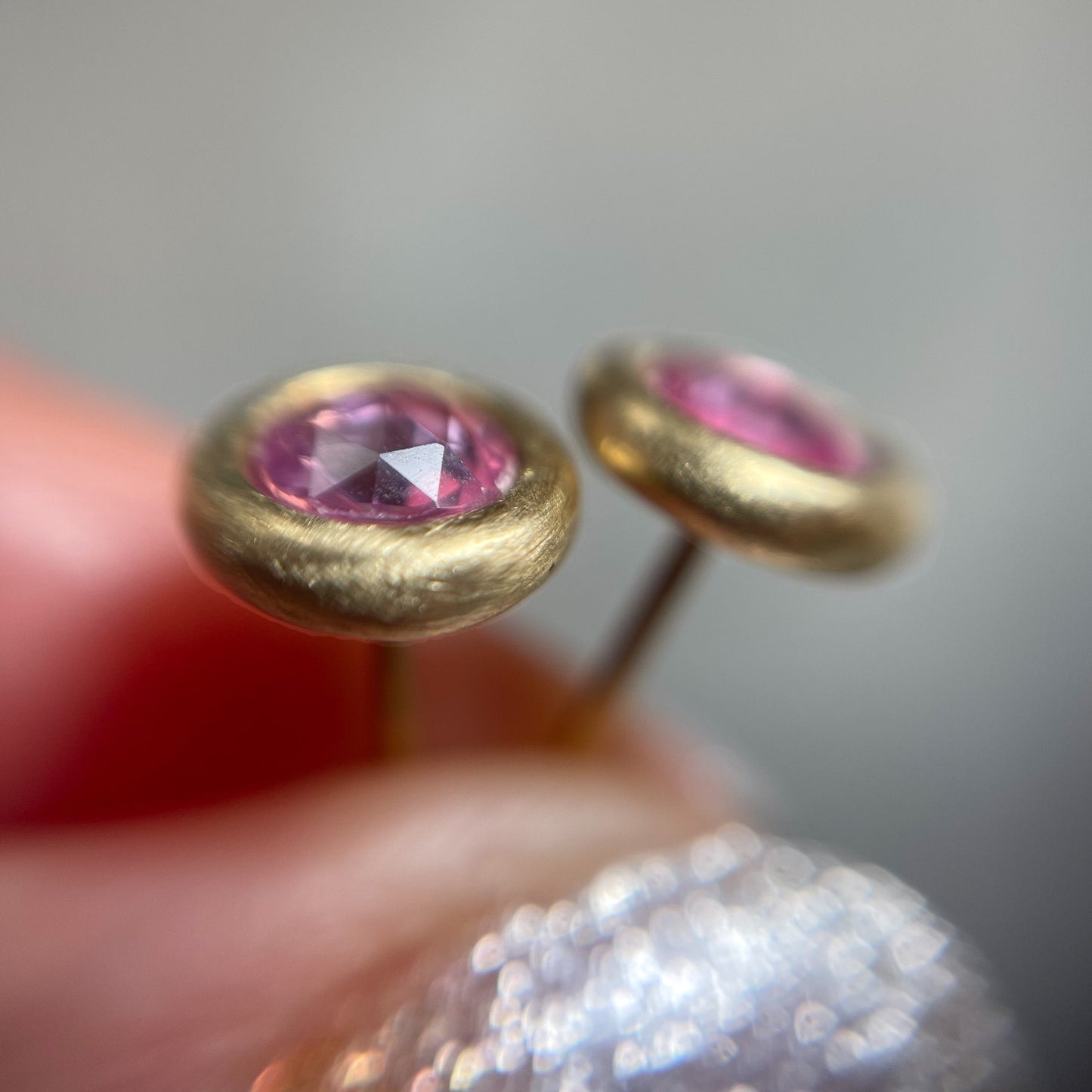 Side view of gold sapphire stud earrings with rose cut sapphires by NIXIN Jewelry
