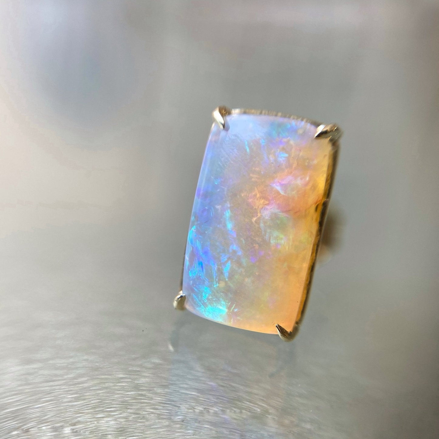 14k Gold opal stud earrings by NIXIN Jewelry