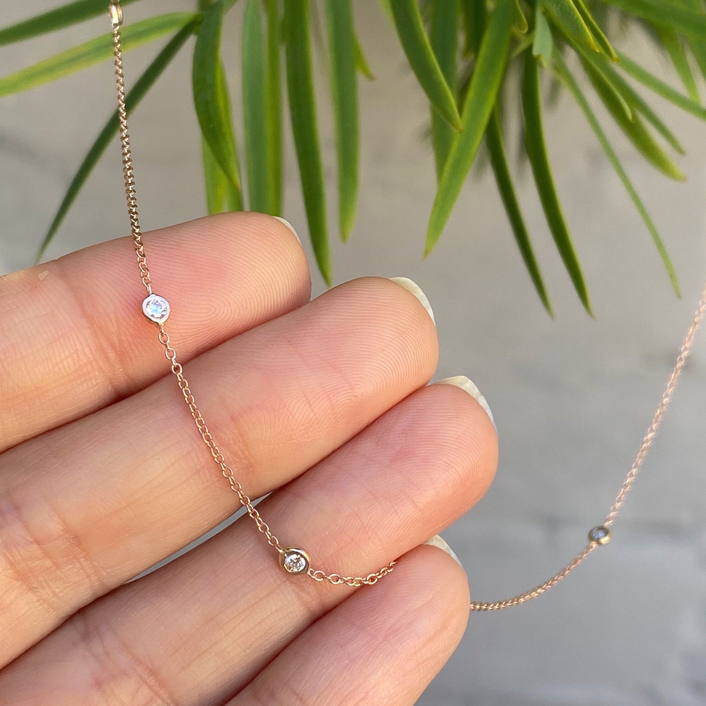 asymmetrical station diamond necklace by NIXIN Jewelry