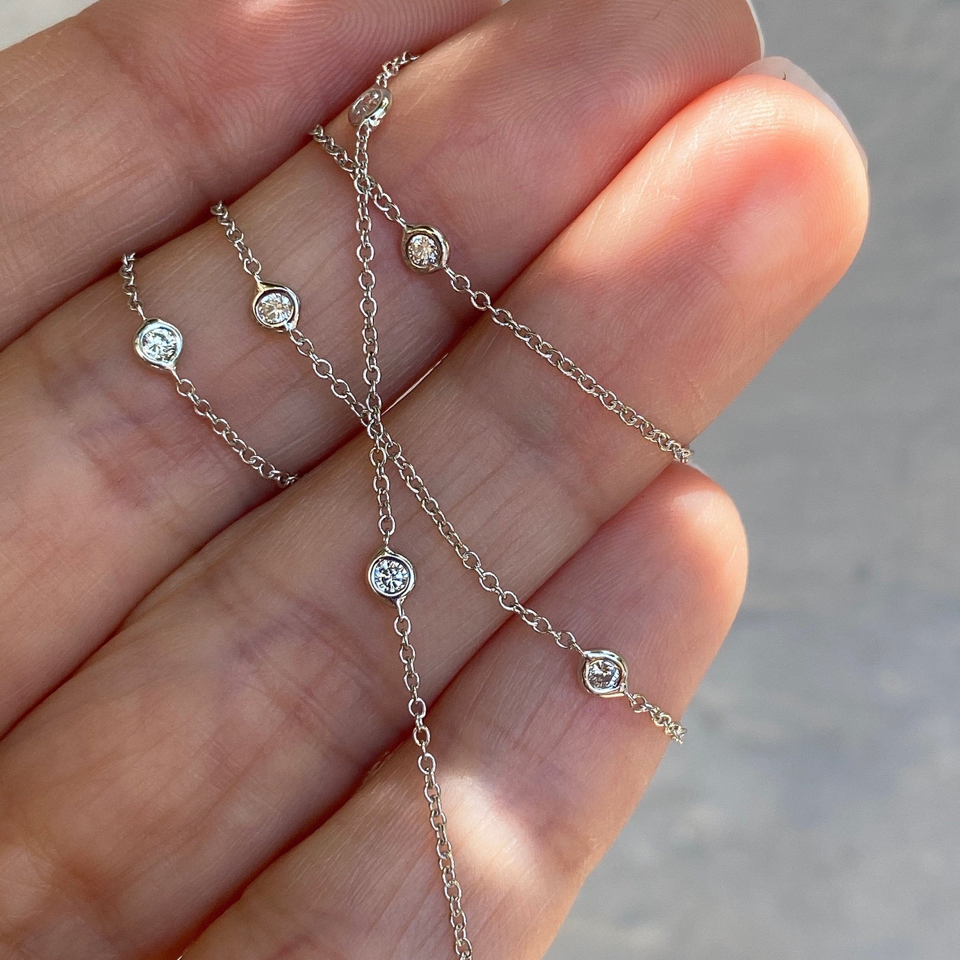 asymmetrical station diamond necklace by NIXIN Jewelry