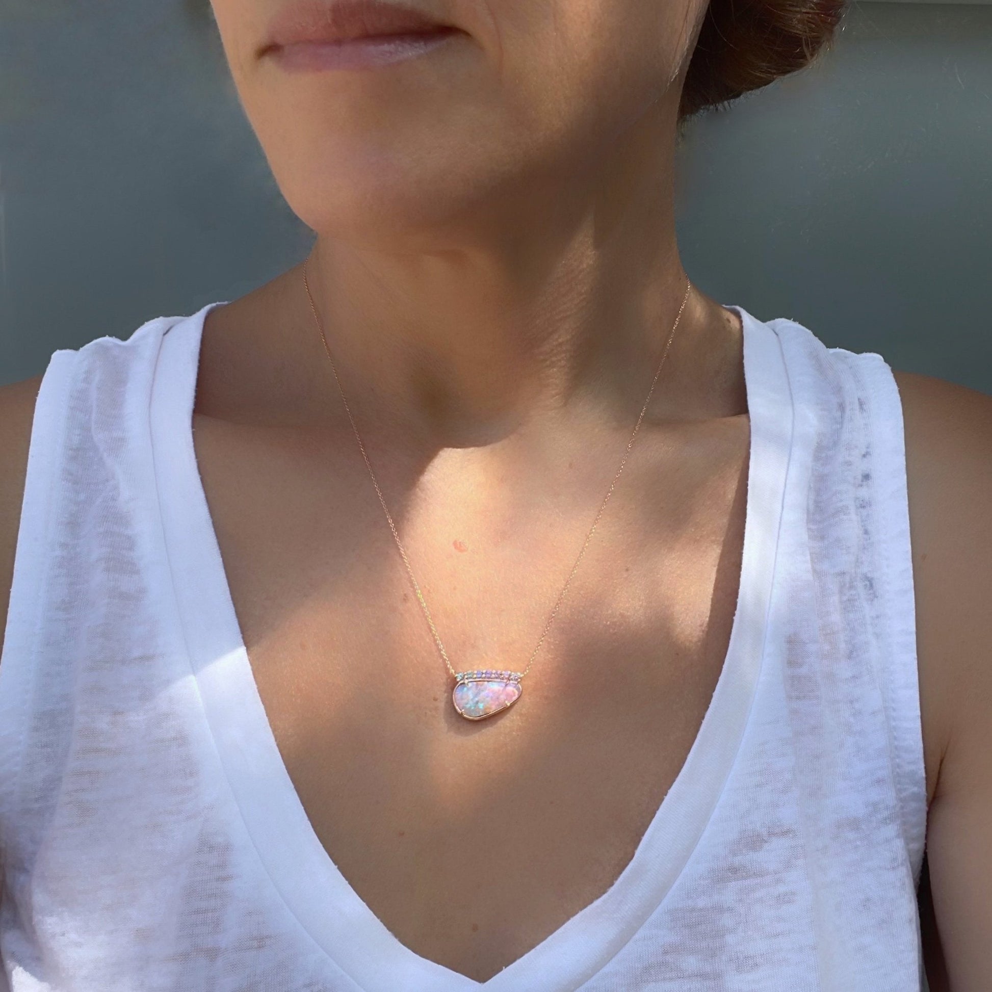 Model wearing Bloom Rose Gold Lavender Opal Sapphire Necklace by NIXIN Jewelry