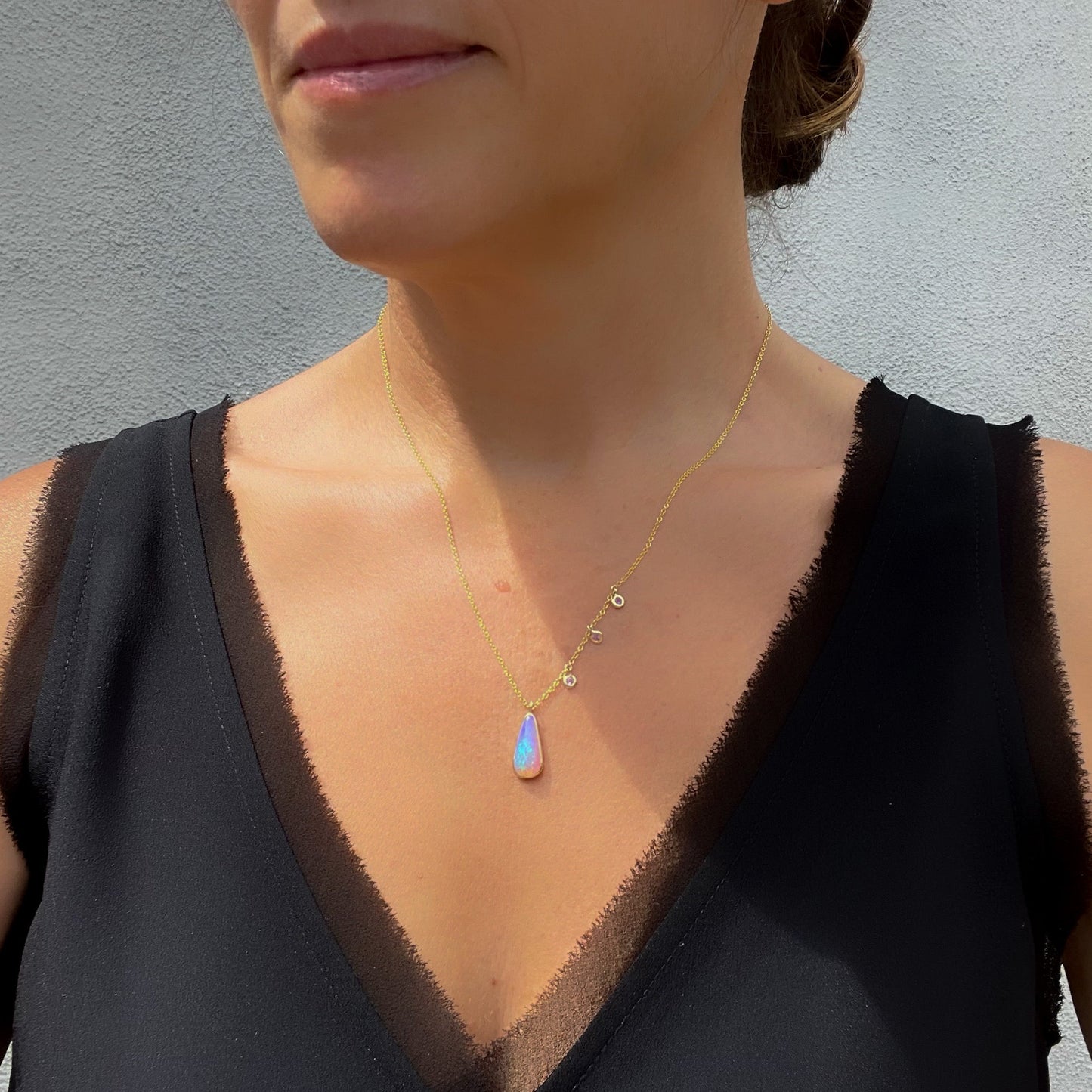 Australian Opal Necklace by NIXIN Jewelry on model. Australian opal jewelry.