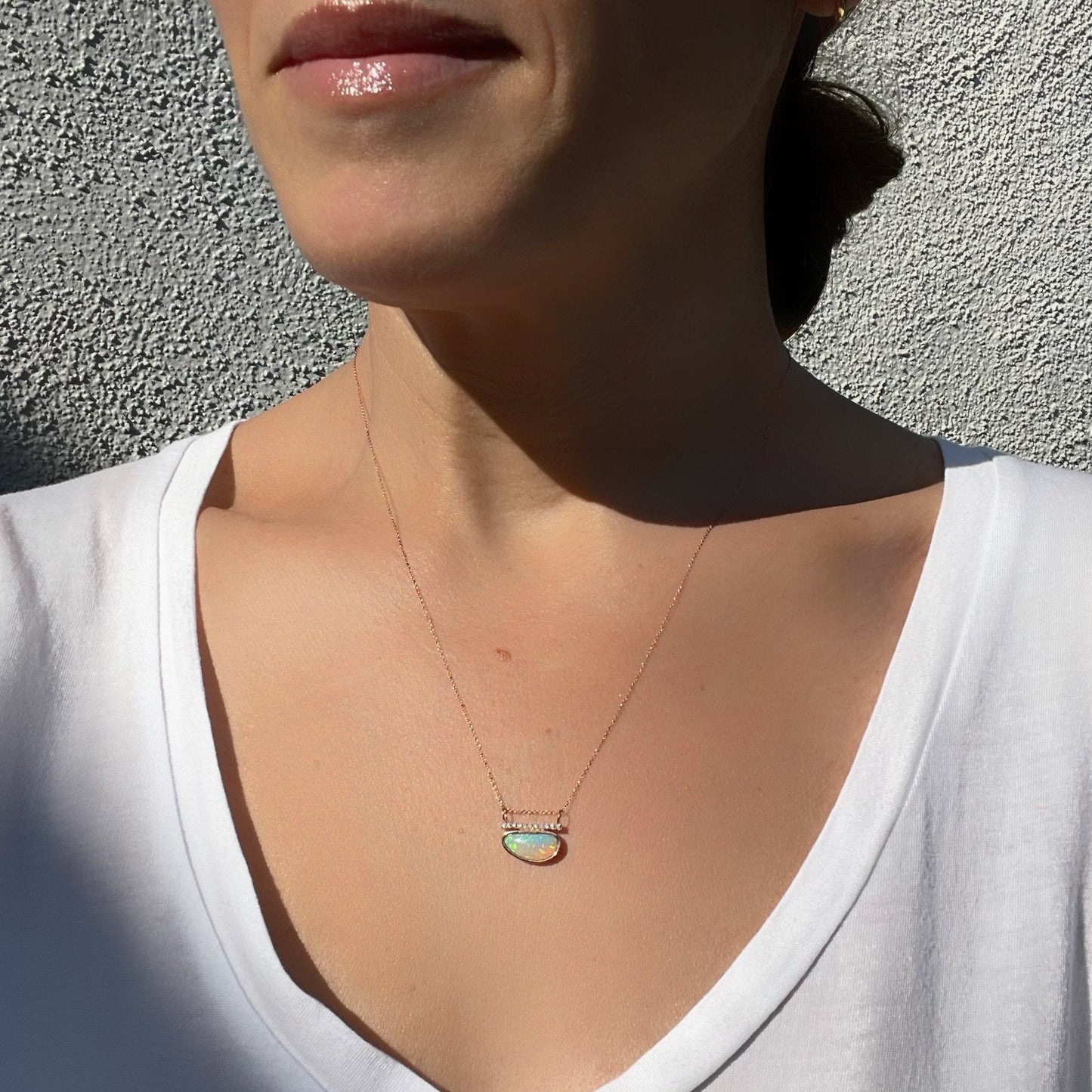 Australian opal necklace by NIXIN Jewelry on model