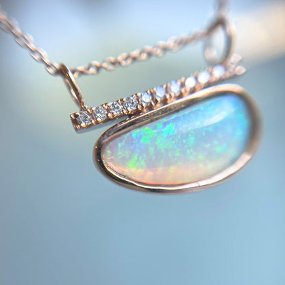 Australian opal necklace by NIXIN Jewelry shown suspended