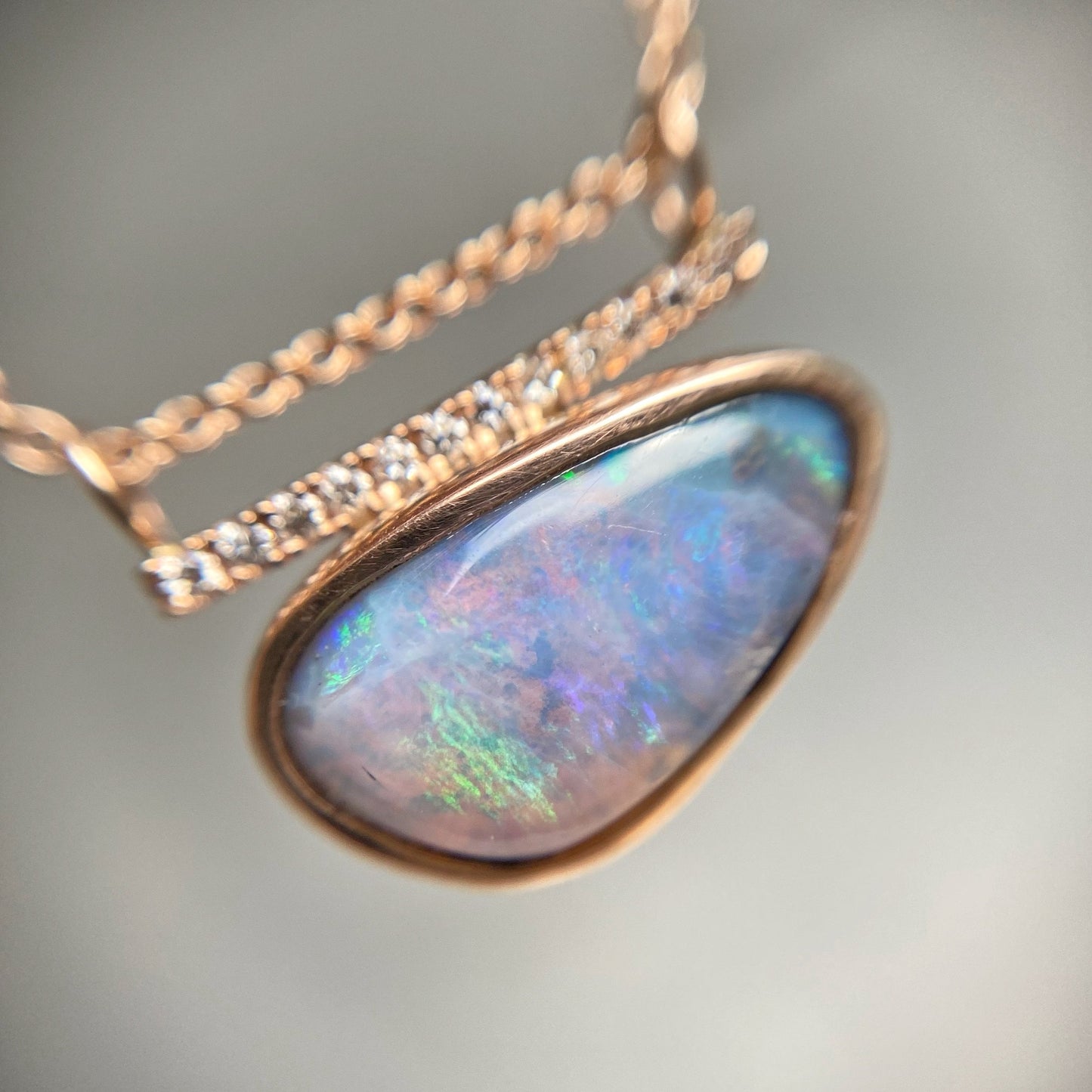 Close up of purple and pink opal necklace by NIXIN Jewelry