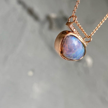 Shot of bezel set boulder opal necklace by NIXIN Jewelry