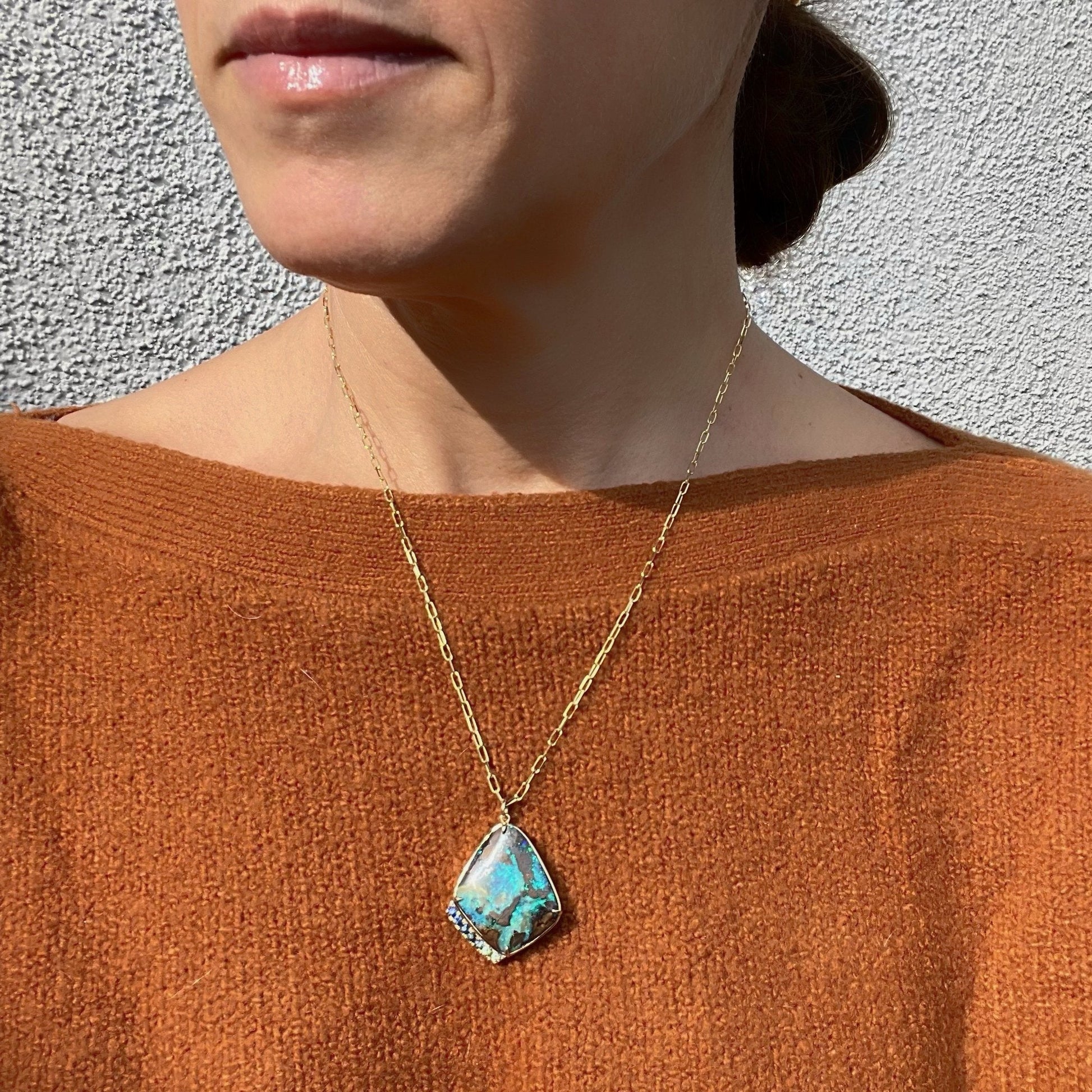 Hidden Cove Sapphire and Opal Necklace by NIXIN Jewelry on model