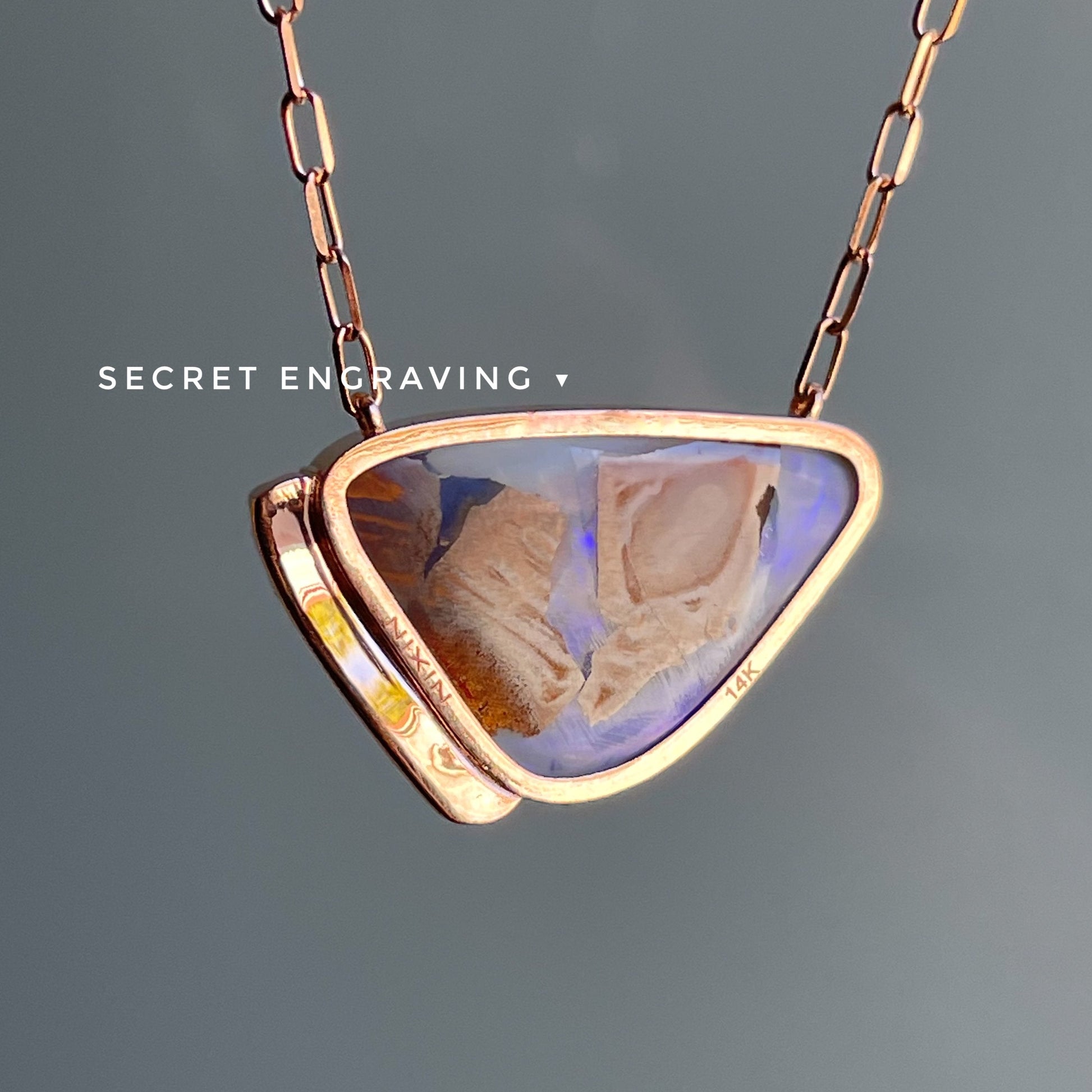 Back of rose gold opal sapphire necklace by NIXIN Jewelry