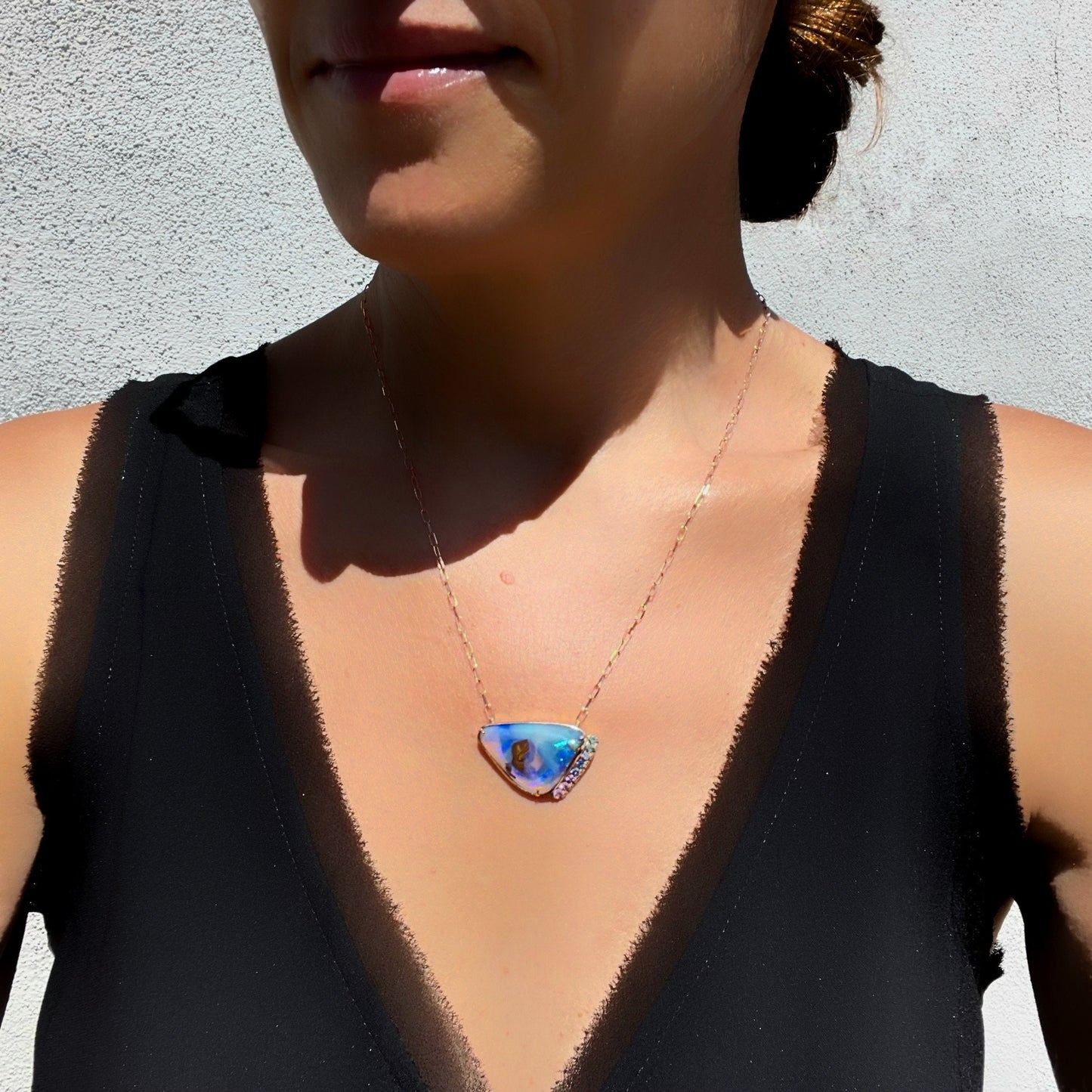 Blue and lavender opal necklace by NIXIN Jewelry on model
