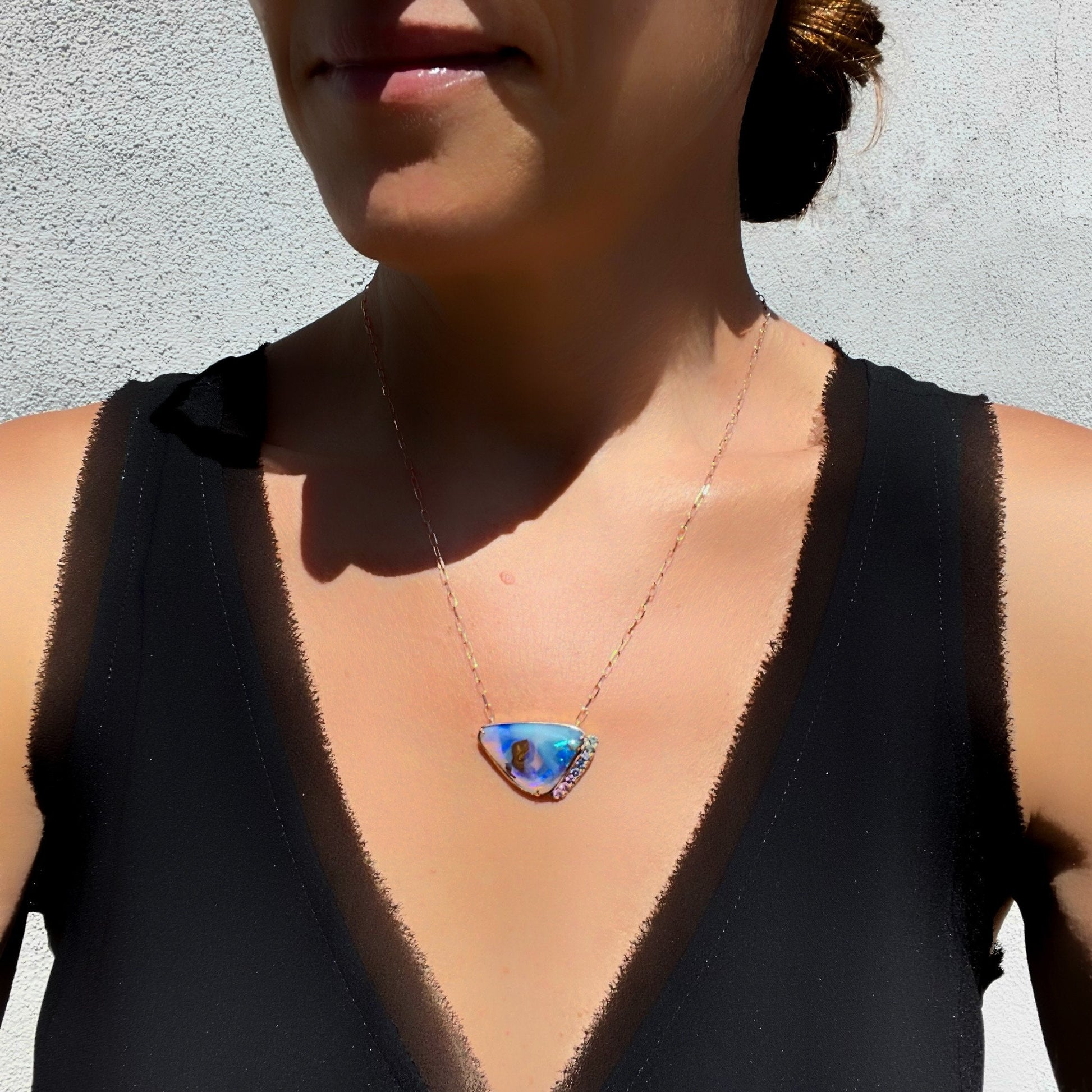 Blue and lavender opal necklace by NIXIN Jewelry on model