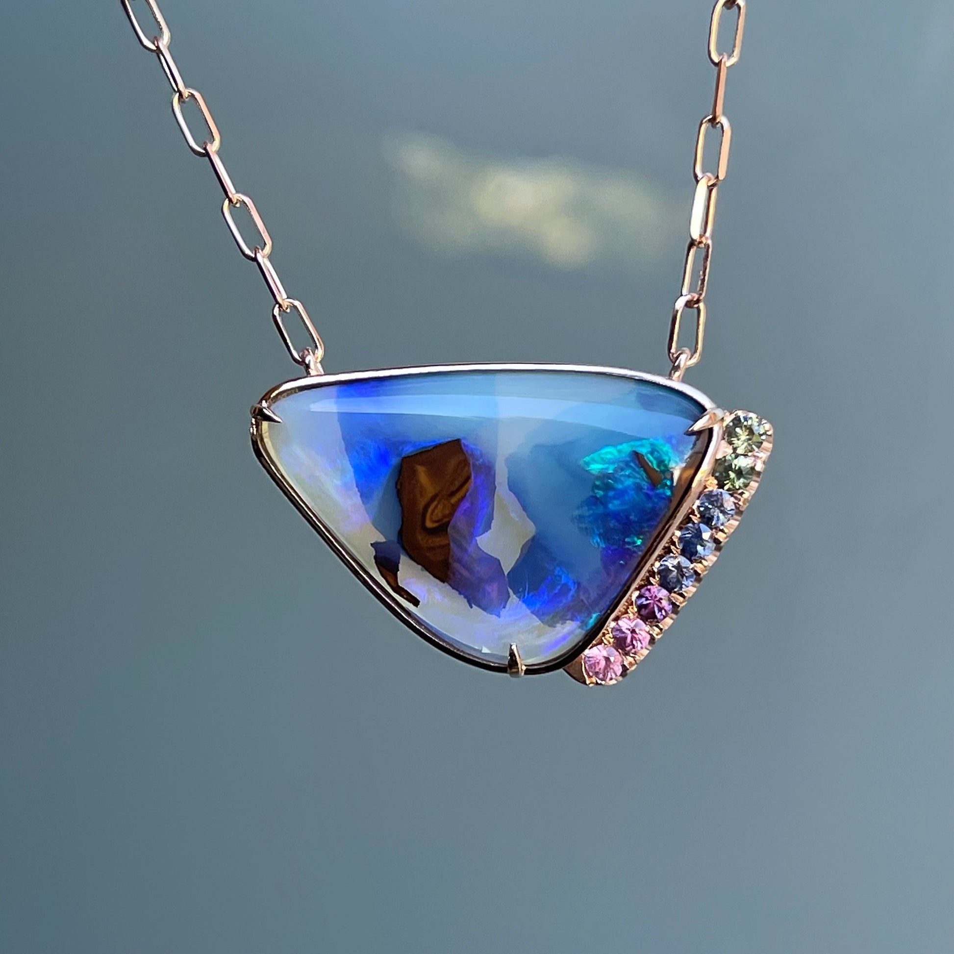 Crystal boulder opal and blue green sapphire pendant by NIXIN Jewelry