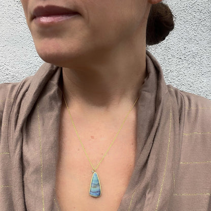 Australian opal necklace by NIXIN Jewelry shown on model