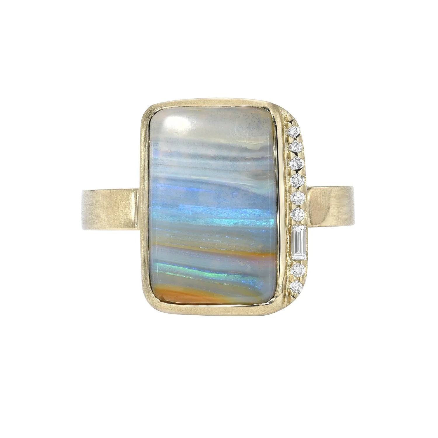 An Australian Opal Ring by NIXIN Jewelry with a blue opal shot in front of a white backdrop.