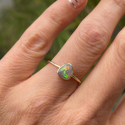 Shot on hand of green crystal opal ring by NIXIN Jewelry