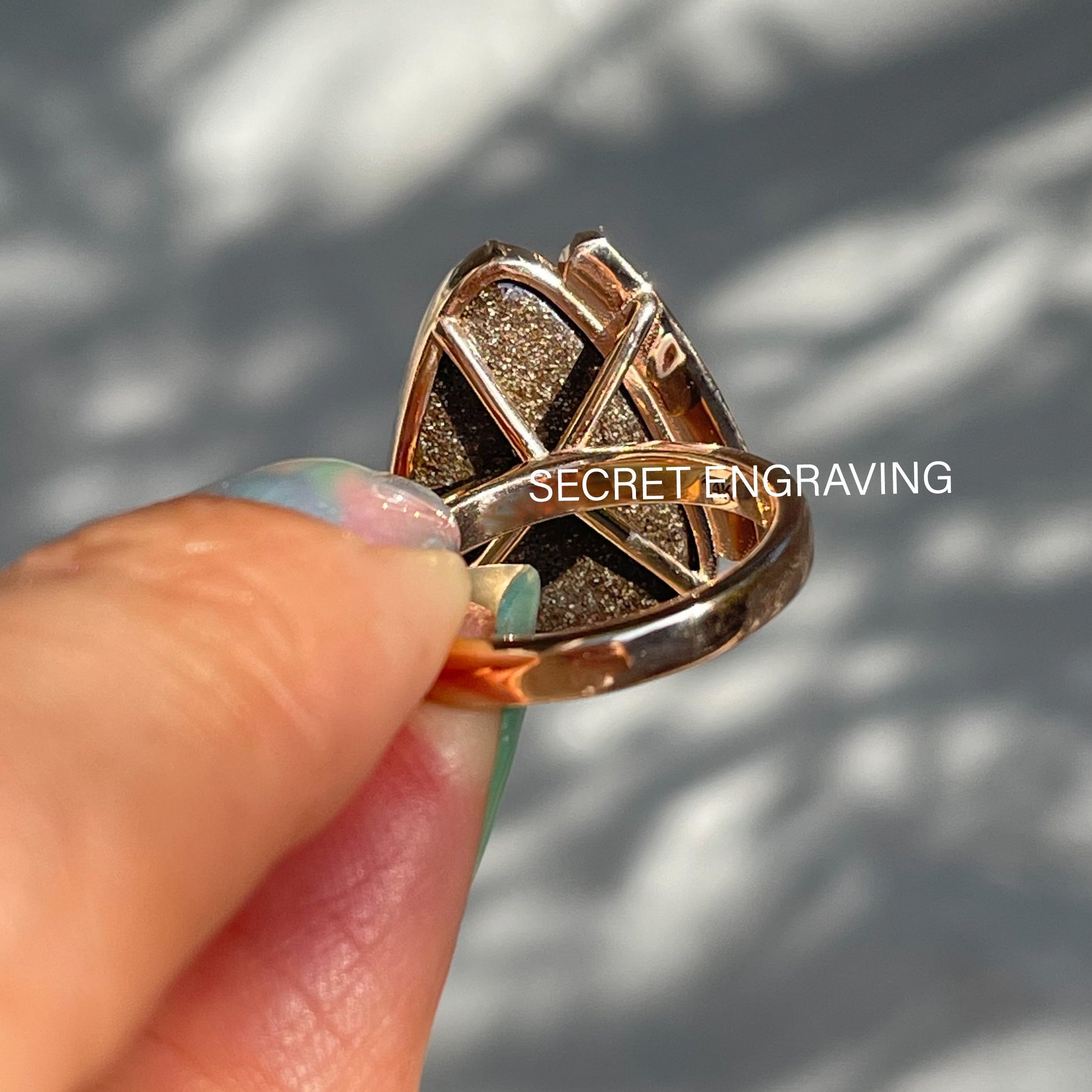 Back view of Australian Opal Ring by NIXIN Jewelry displaying location of secret engraving.