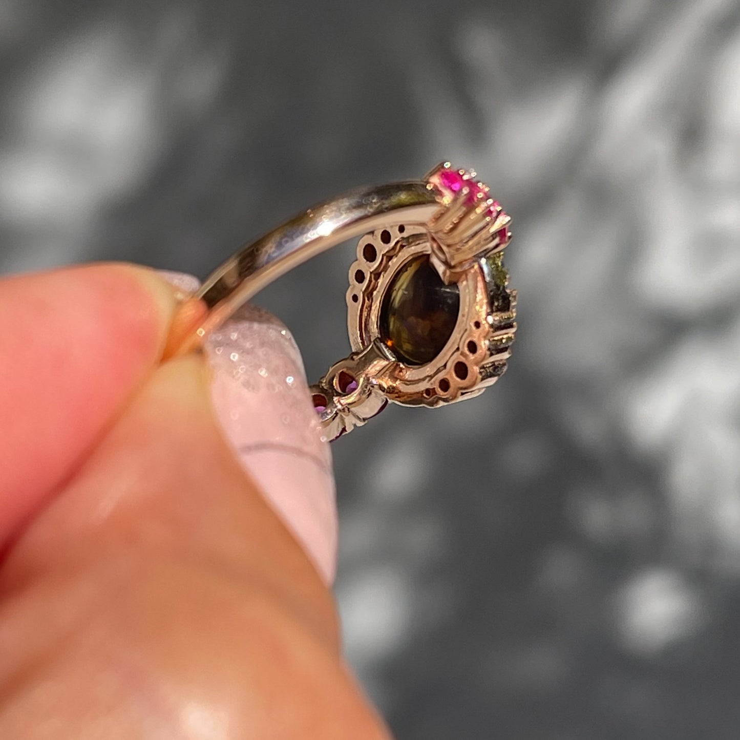 Sapphire and Opal Ring by NIXIN Jewelry showing back of mounting. Pink and blue sapphire opal ring.