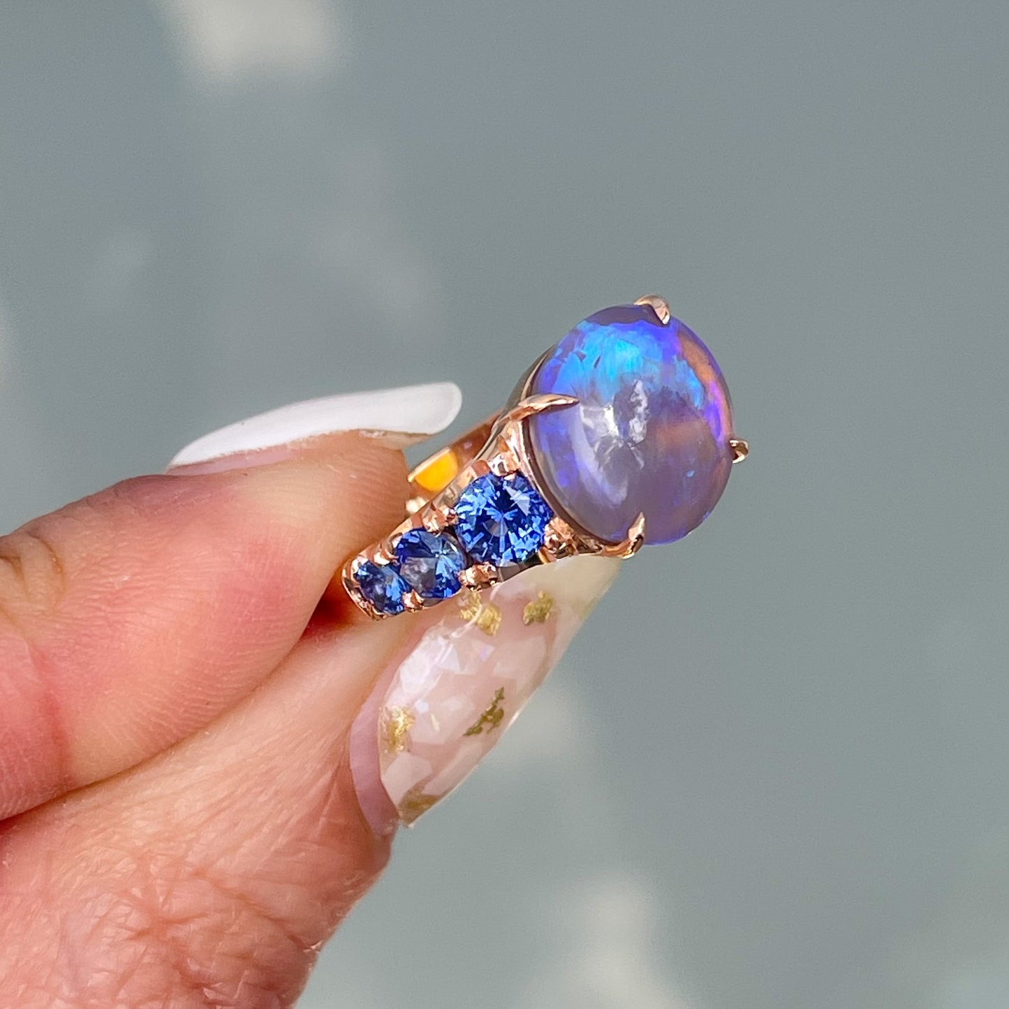 ring Ode to Violet Sapphire and Opal Ring