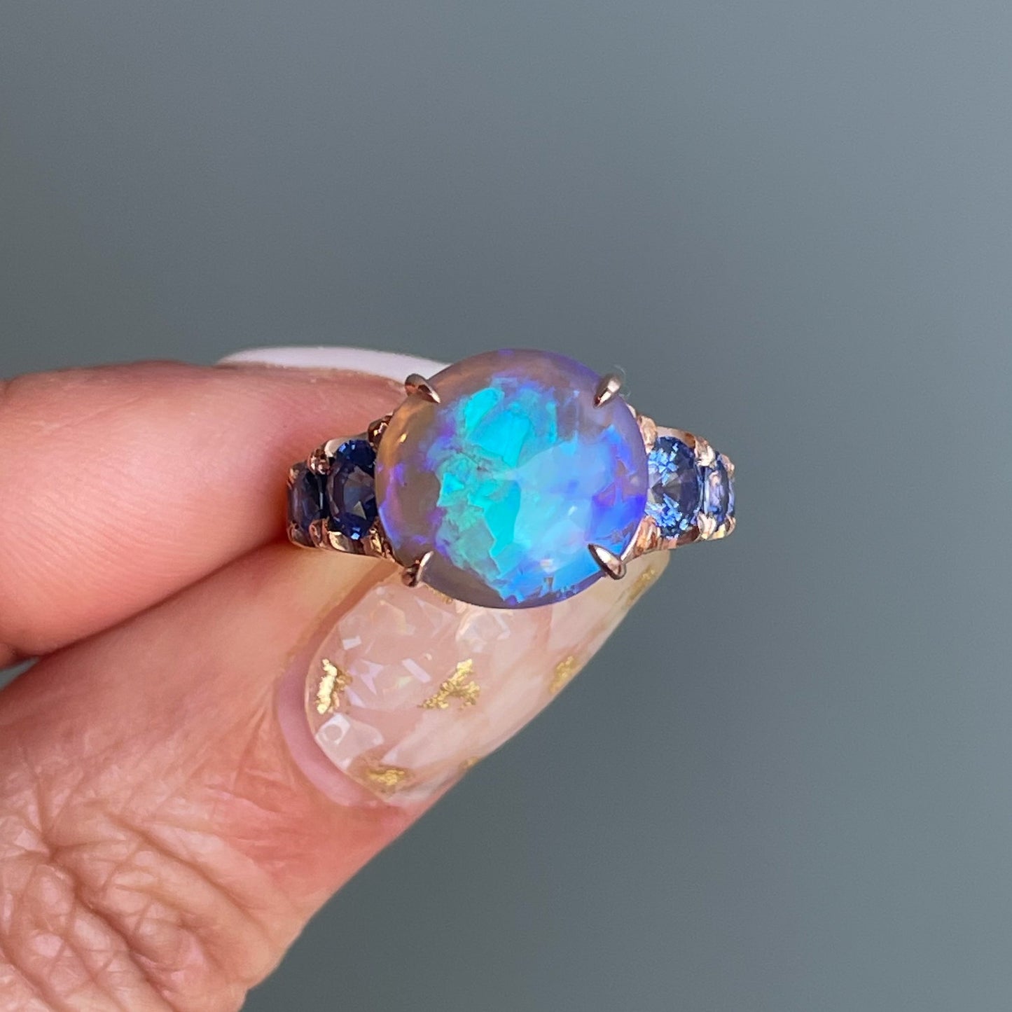 ring Ode to Violet Sapphire and Opal Ring