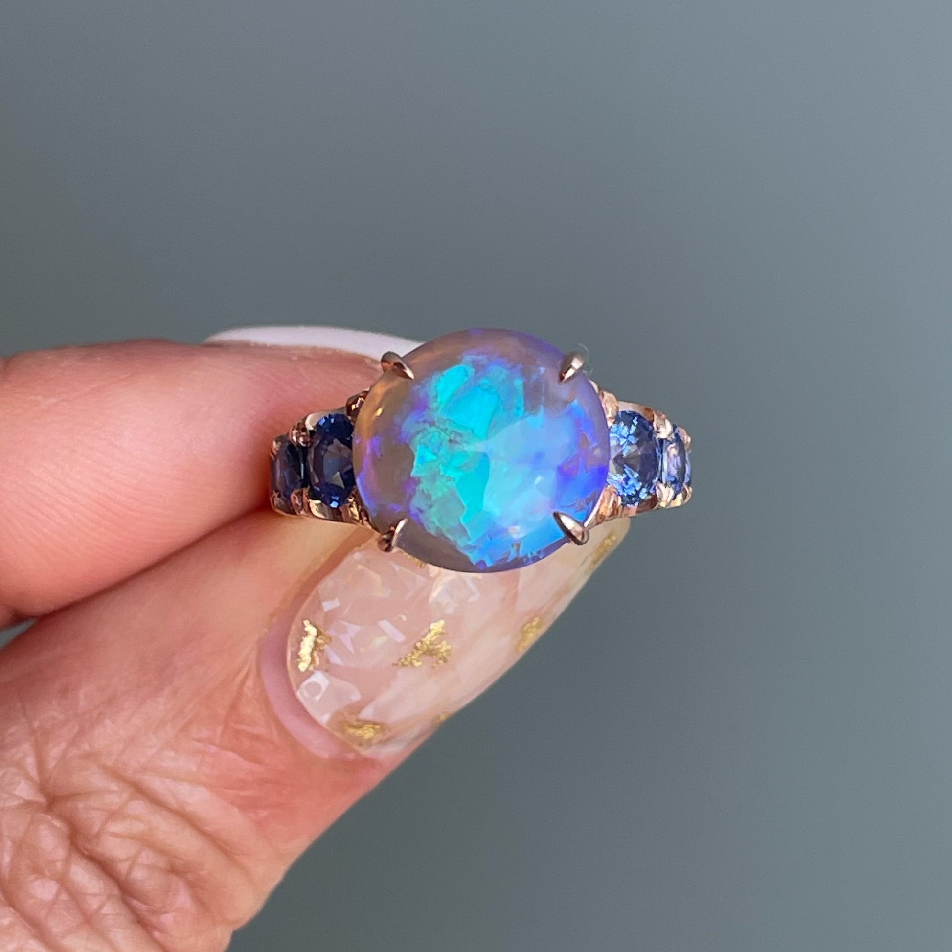 ring Ode to Violet Sapphire and Opal Ring