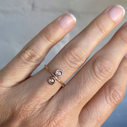 Paleo Double Diamond Slice Rose Gold Ring on hand for scale