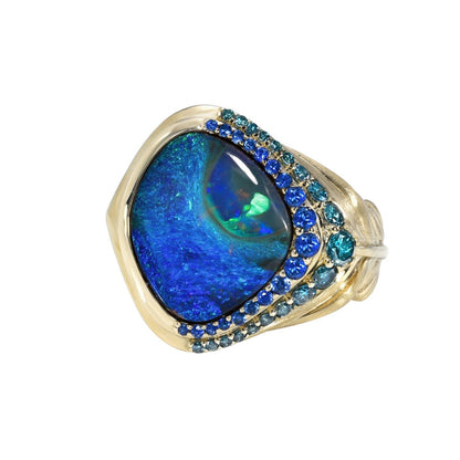 Australian Opal Ring by NIXIN Jewelry on white background. 14k gold boulder opal ring.