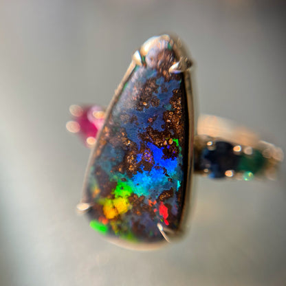 Close up of gold opal ring by NIXIN Jewelry
