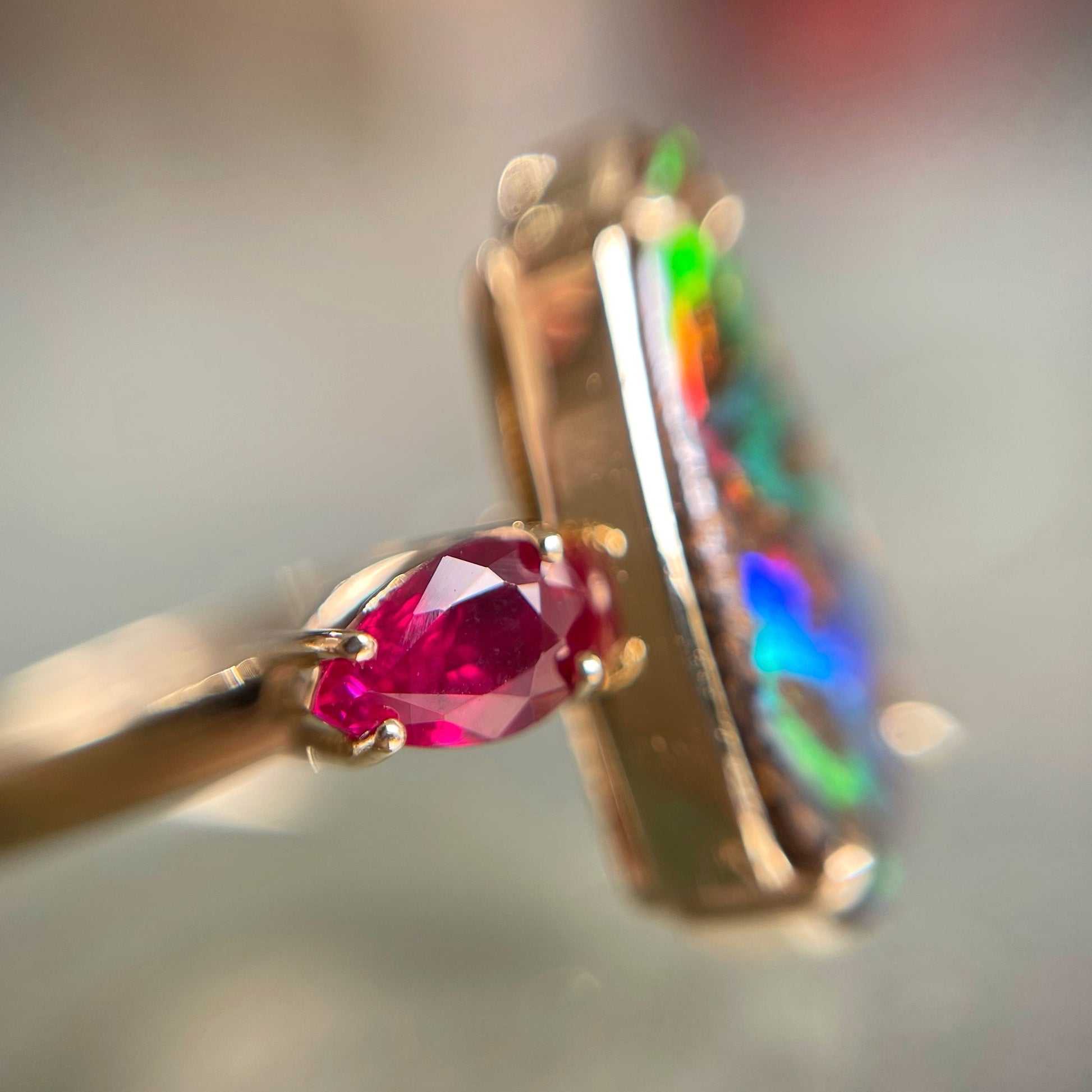 Side view of gold opal and ruby ring showing ruby detail - by NIXIN JEwelry
