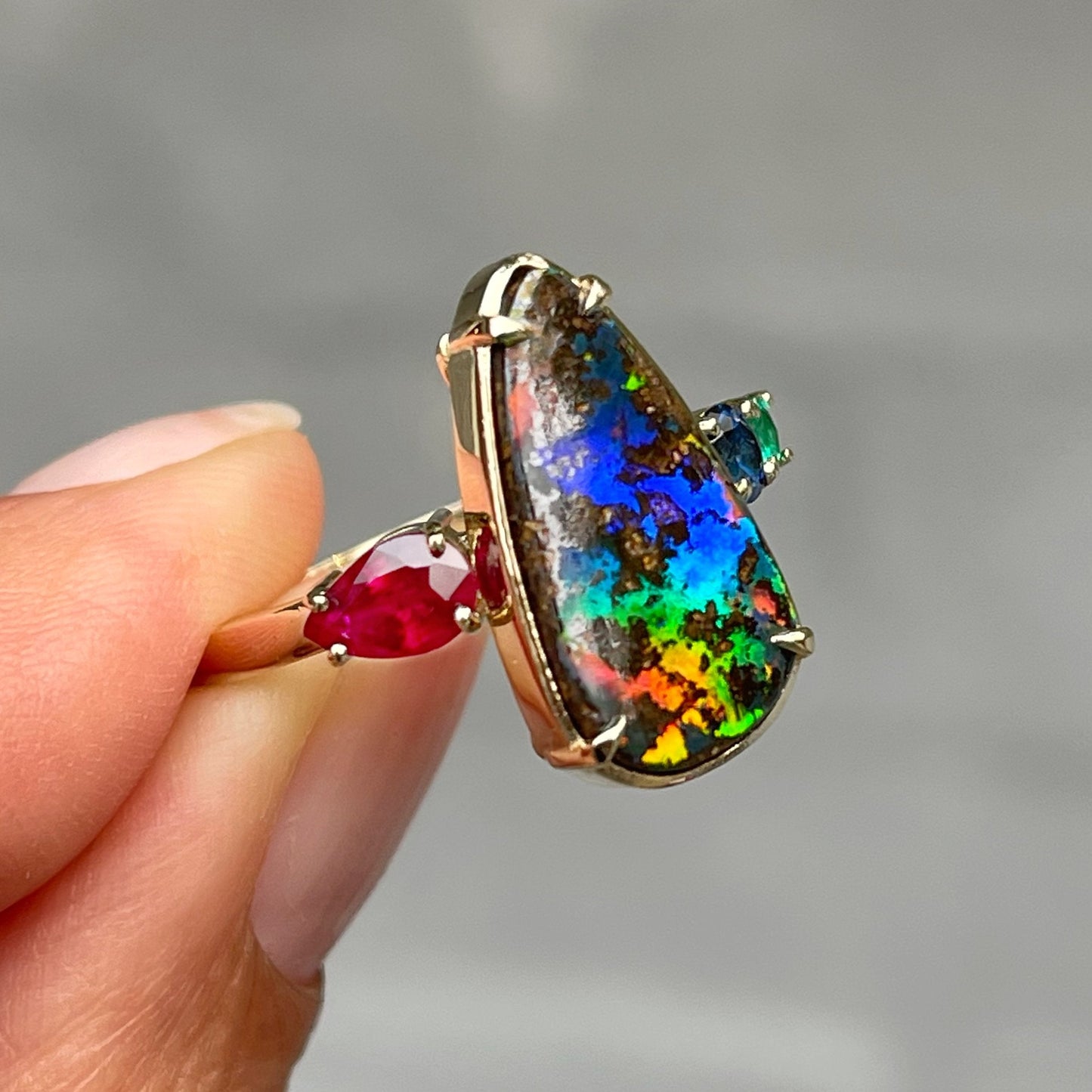 Boulder opal ring with rainbow opal by NIXIN Jewelry