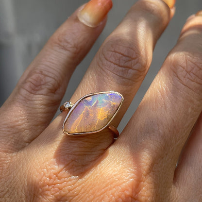 Zion Dali Australian Opal Ring by NIXIN Jewelry modeled on hand. Pipe opal ring.